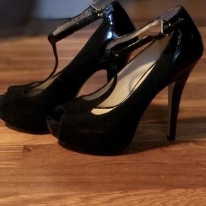INC super high heeled T-strap pumps.